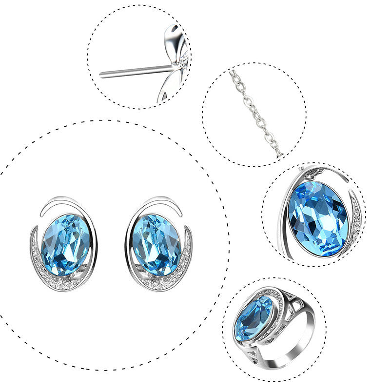 Luxurious Three-Piece Jewelry Set with Oval-Cut Blue Gemstone