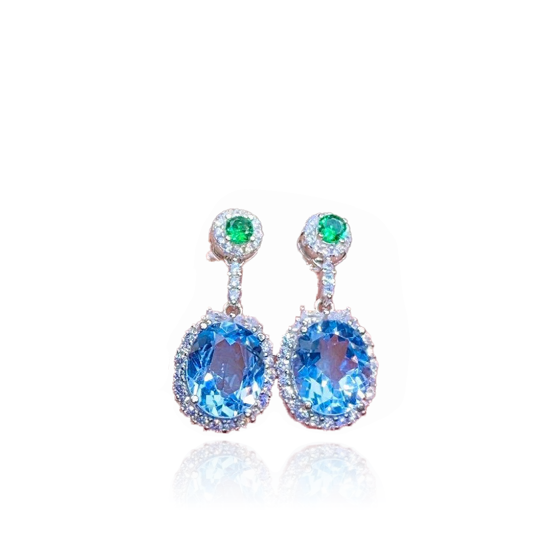 Boucles d'oreilles pendantes en topaze et bague en cristal